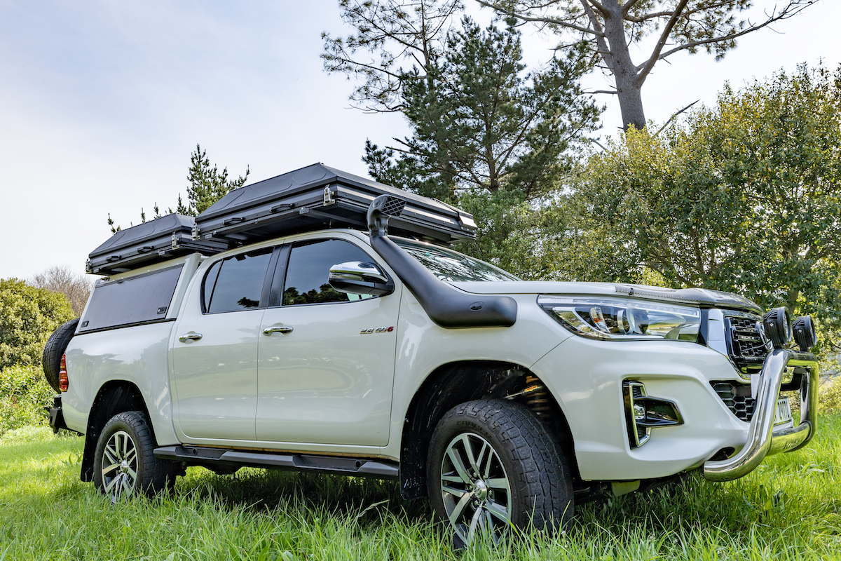 Marula 4x4 Toyota Hilux with rooftop tents in a grassy field