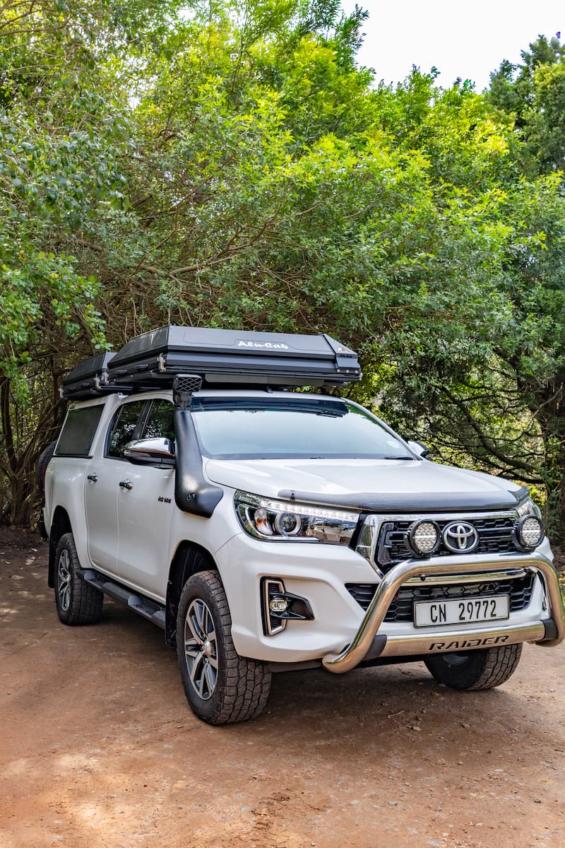 Marula 4x4 Toyota Hilux with rooftop tent on a forest track