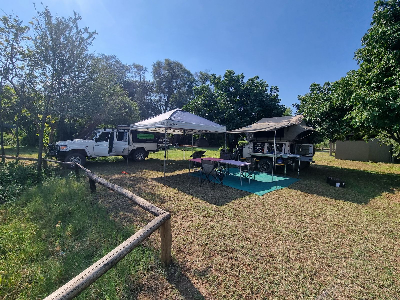 A family campsite with 4x4, gazebo and off-road trailer